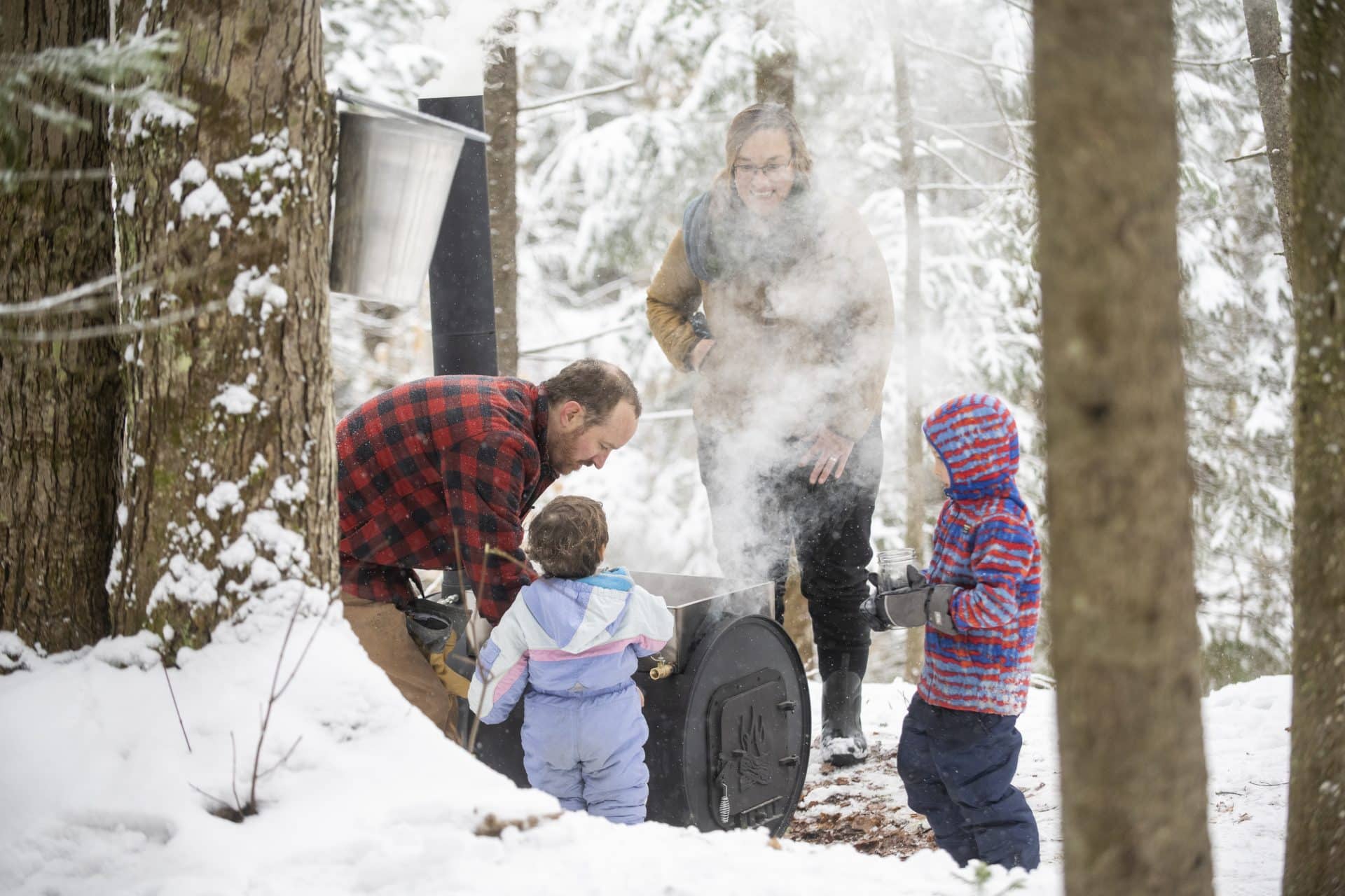 Family Making Maple Syrup
