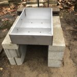 Sapling Evaporator Pan on Cinder Blocks
